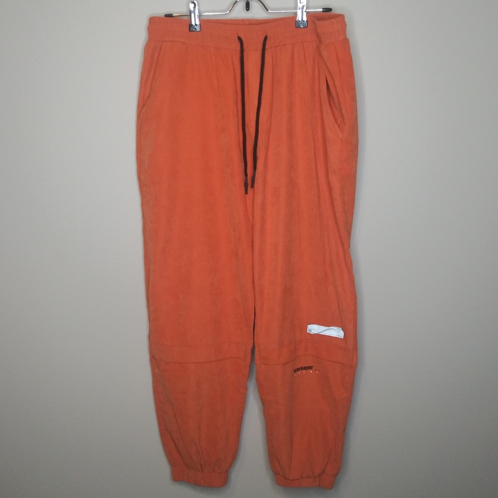 Orange joggers, prison pants aesthetic